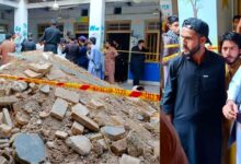 Peshawar school roof collapse site in Dir Colony inspected by PML-N MPA Malik Tariq Awan alongside concrete debris and yellow police tape.