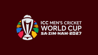 TMen’s Cricket World Cup 2027, the official logo for the ICC features a deep maroon background with colourful geometric side patterns. The central white emblem depicts the World Cup trophy surrounded by vibrant, colourful shapes, with the text "ICC MEN'S CRICKET WORLD CUP" above "SA·ZIM·NAM·2027".