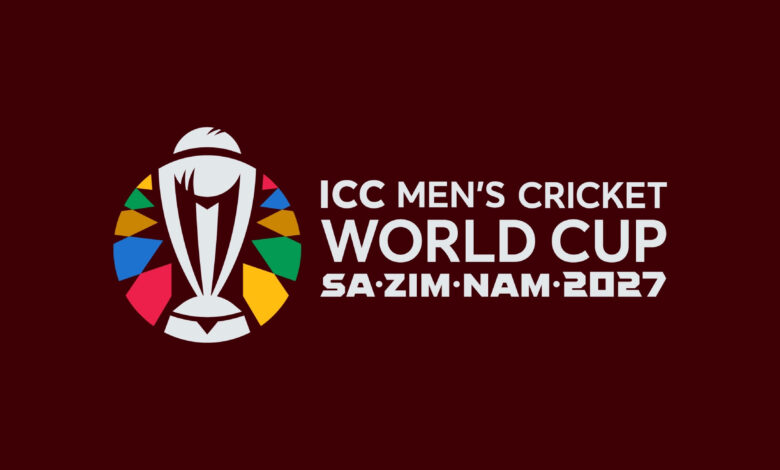 TMen’s Cricket World Cup 2027, the official logo for the ICC features a deep maroon background with colourful geometric side patterns. The central white emblem depicts the World Cup trophy surrounded by vibrant, colourful shapes, with the text "ICC MEN'S CRICKET WORLD CUP" above "SA·ZIM·NAM·2027".